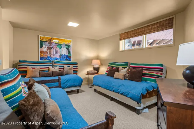 a view of balcony with wooden floor and fence