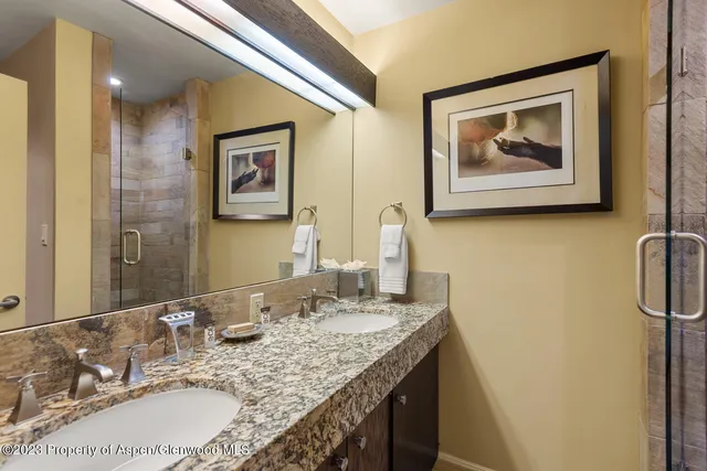 a backyard of a house with large trees