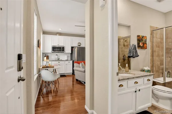 a view of living room and kitchen with furniture
