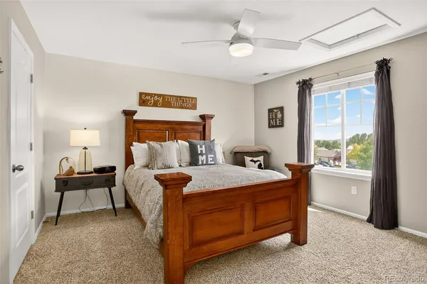 a bed room with a bed and a table