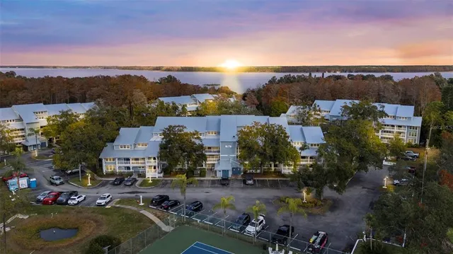 an aerial view of a house with a swimming pool