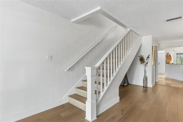 a view of a bathroom from the hallway
