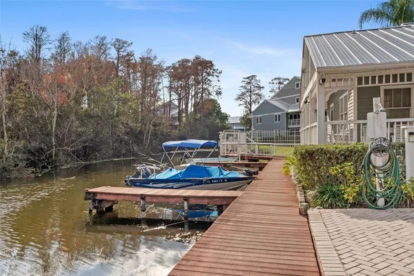 aerial view of a house with a lake view
