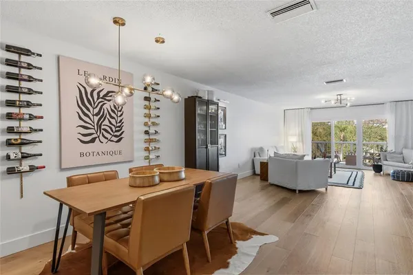 a dining room with furniture window wooden floor