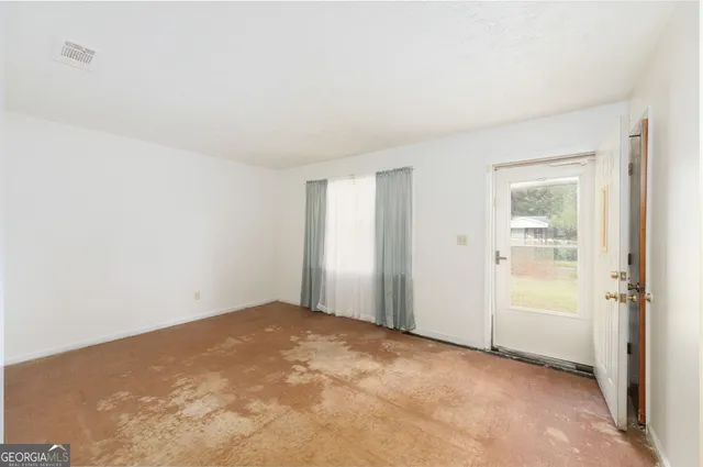 an empty room with closet