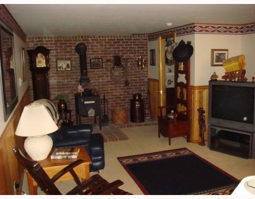 1672 Reissing Road McDonald, PA 15057 - Photo 3 of 8 Den/Family/Great Room. Includes Brick Wall & Hearth with Stove