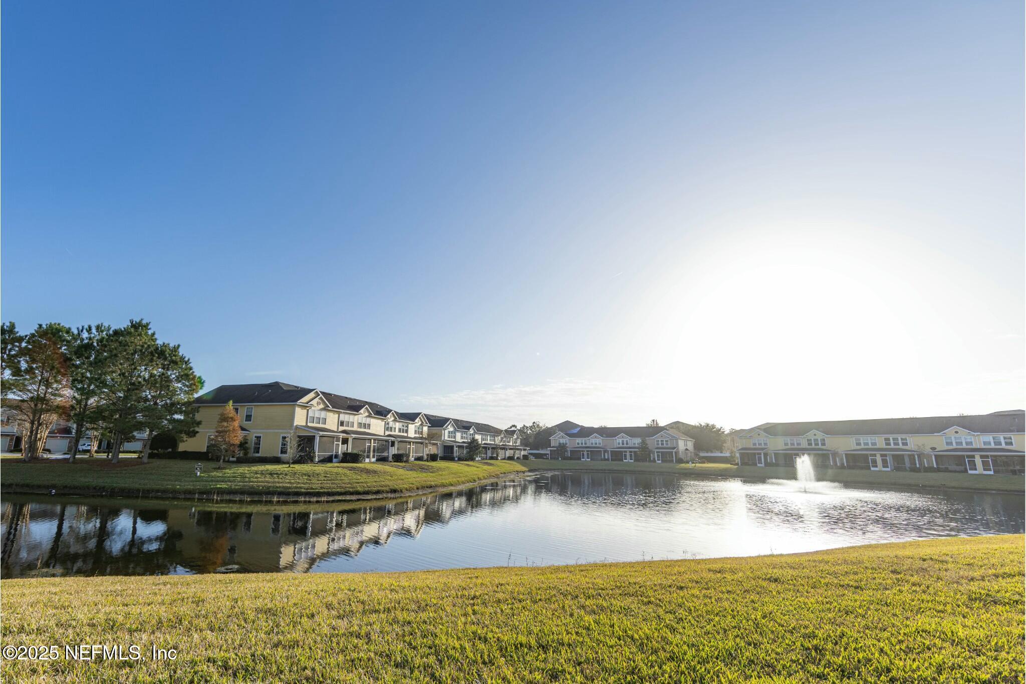 6862 Roundleaf Drive Jacksonville, FL 32258 - Photo 13 of 32 a view of a lake with a mountain in the background