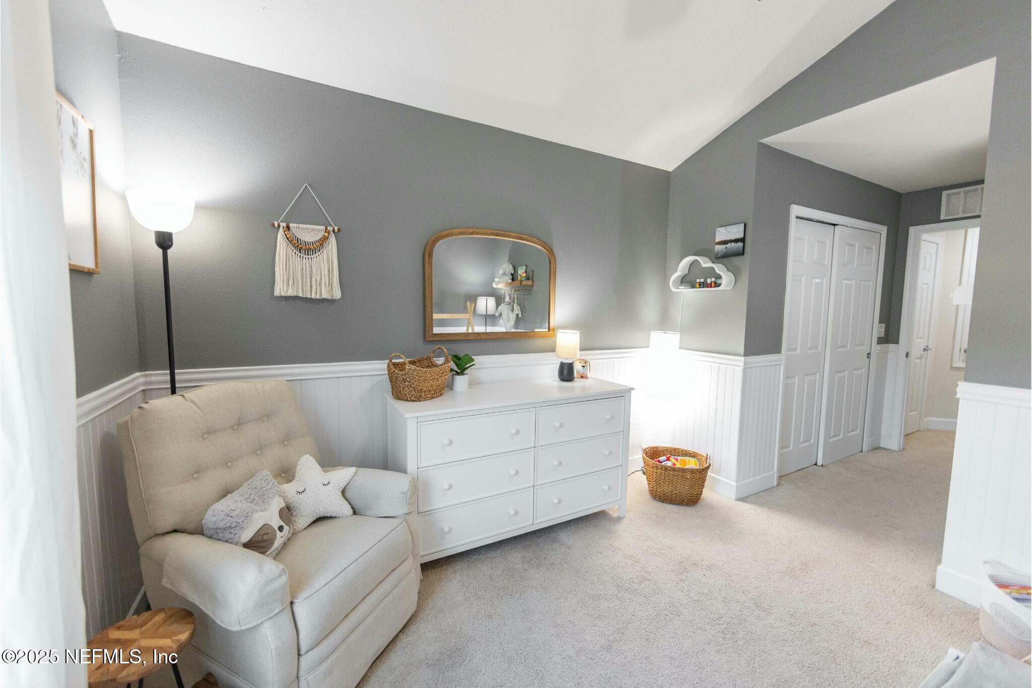 6862 Roundleaf Drive Jacksonville, FL 32258 - Photo 19 of 32 a bedroom with a bed and a couch