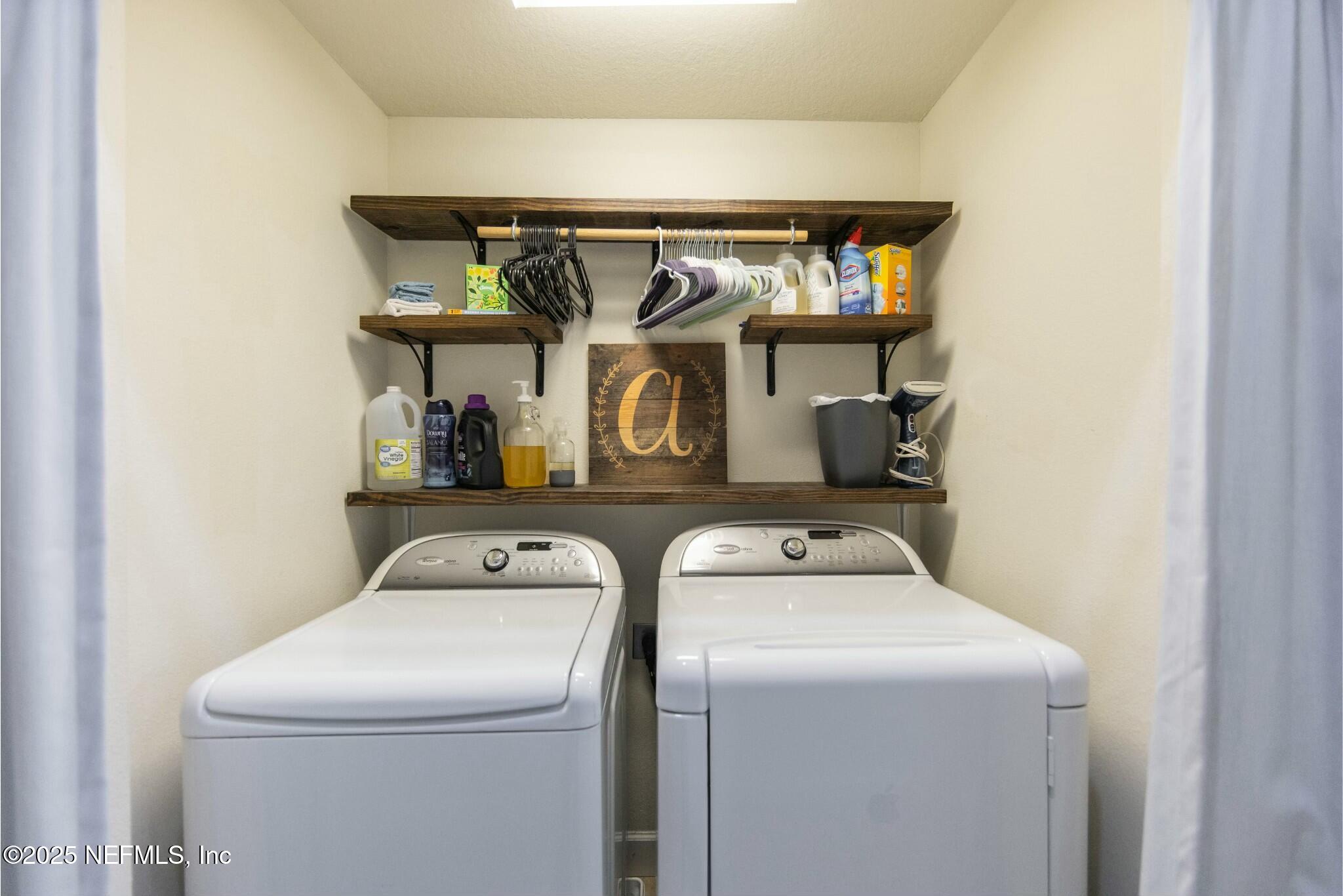 6862 Roundleaf Drive Jacksonville, FL 32258 - Photo 23 of 32 a utility room with dryer and washer