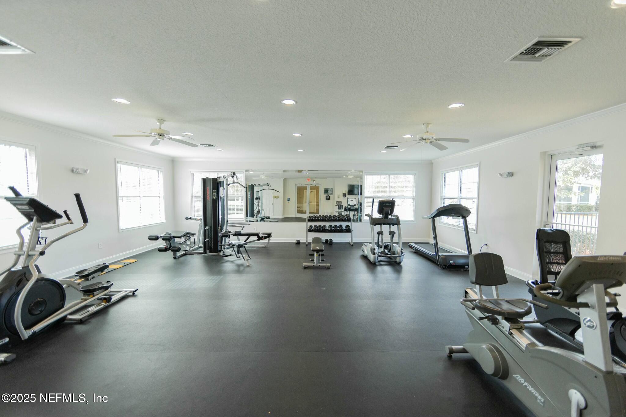 6862 Roundleaf Drive Jacksonville, FL 32258 - Photo 29 of 32 a view of a room with gym equipment