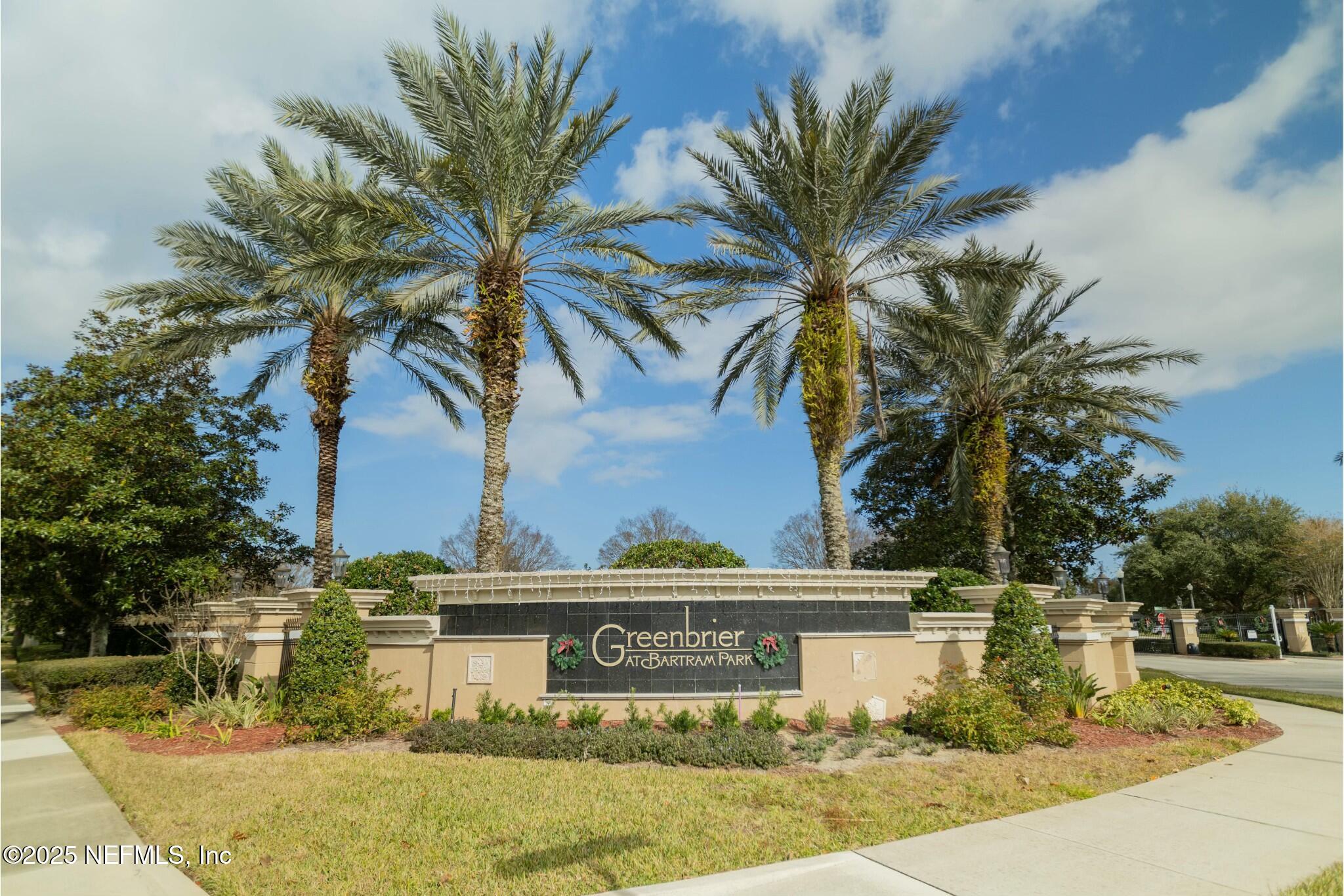 6862 Roundleaf Drive Jacksonville, FL 32258 - Photo 31 of 32 a view of a palm tree with flower plants
