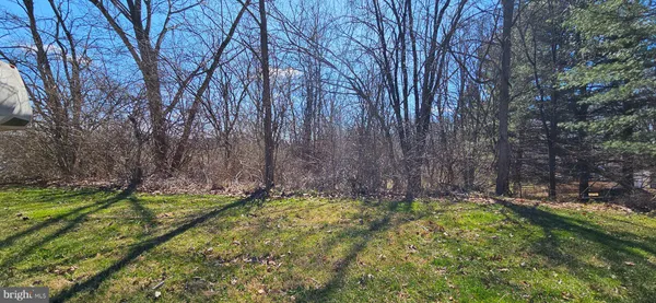 a view of swimming pool with yard