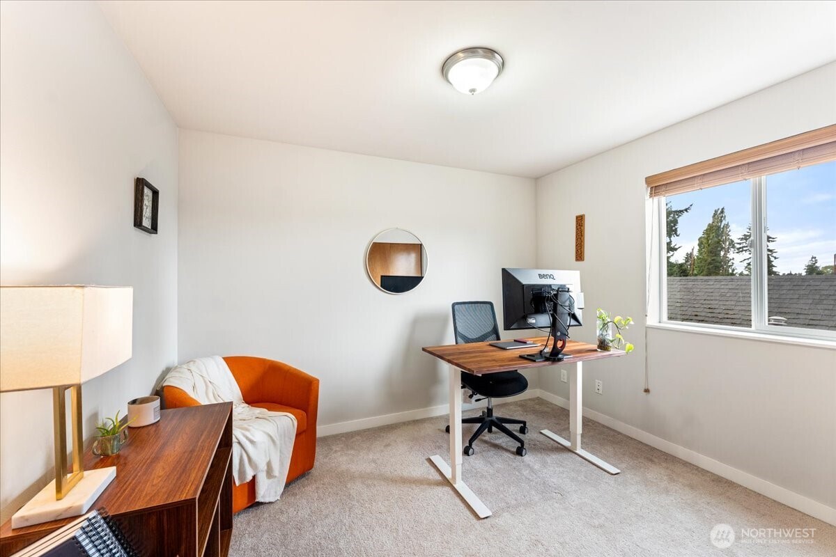 12418 2nd Place Southwest Burien, WA 98146 - Photo 23 of 39 a view of a workspace with furniture and a window