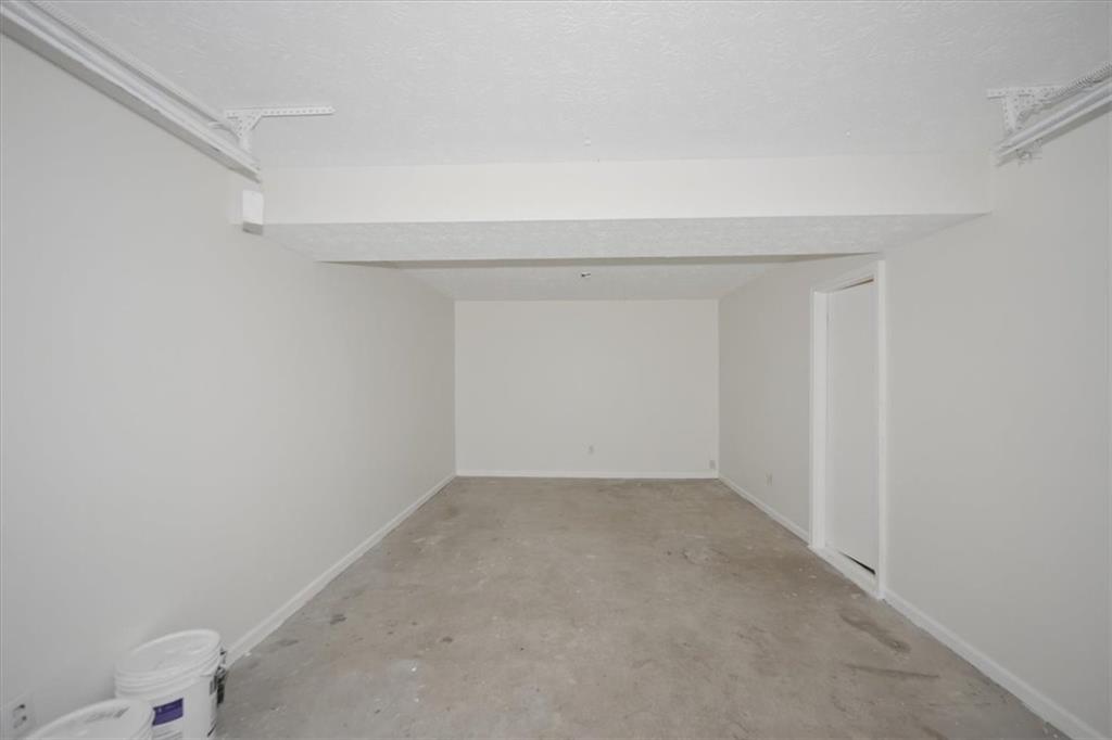 1496 Cherry Hill Road Southwest Conyers, GA 30094 - Photo 13 of 32 a view of an empty room