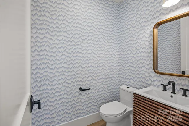 a kitchen with a sink and a window