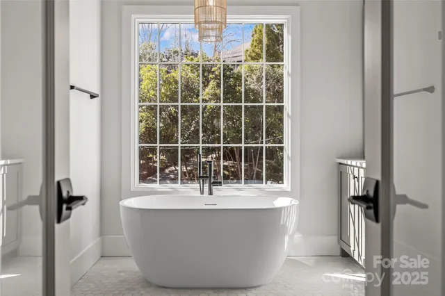 a view of front door with wooden floor