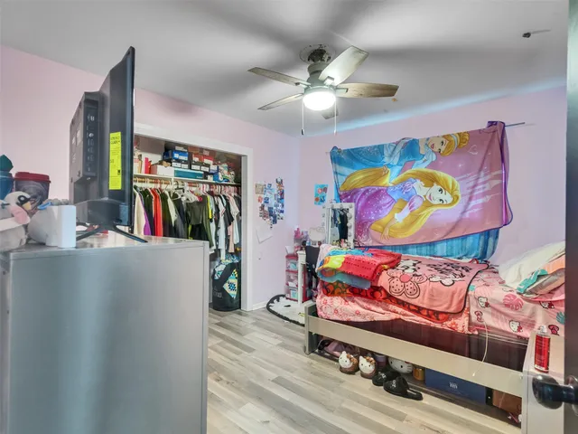 a living room with lots of furniture and a flat screen tv