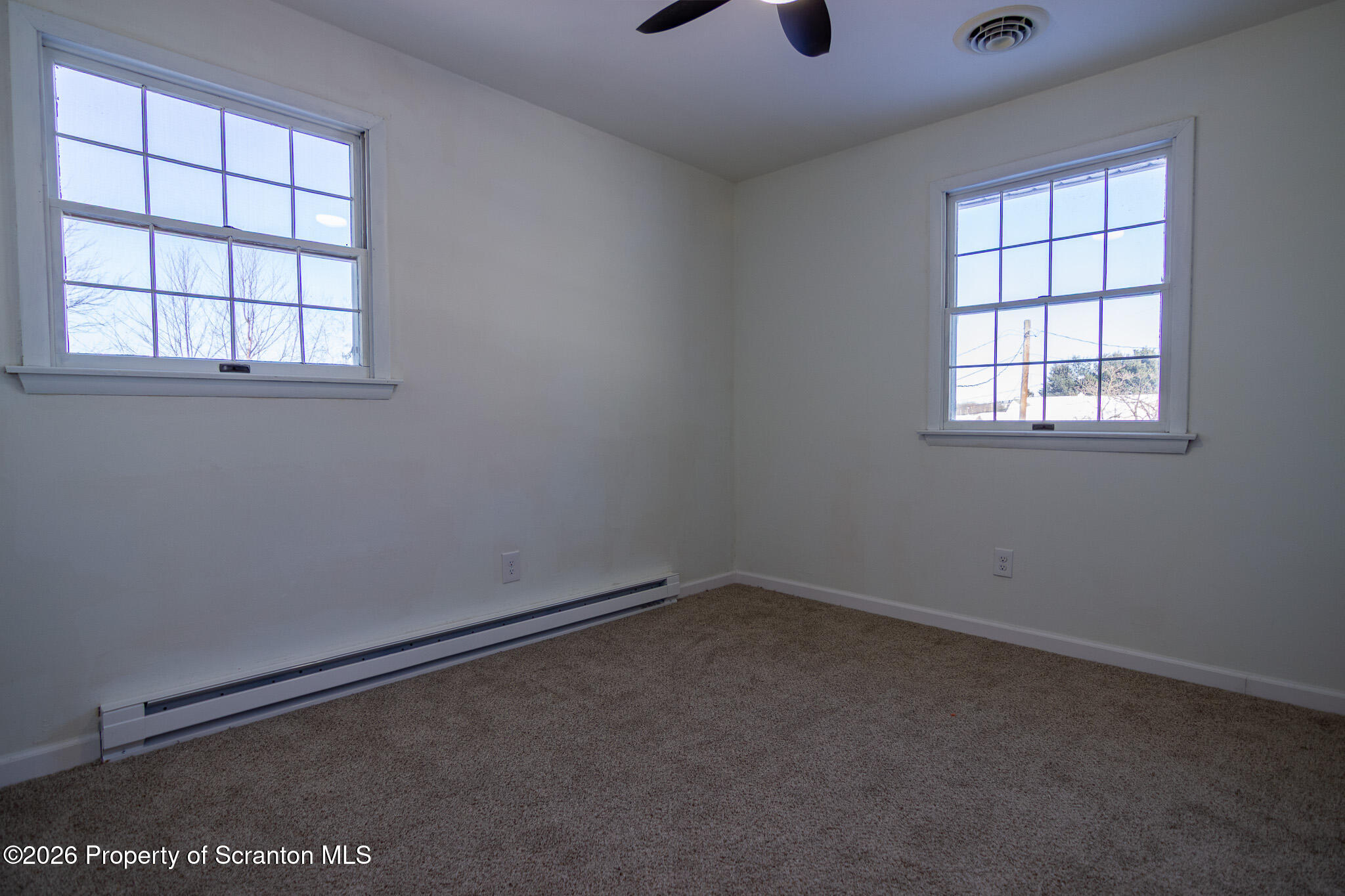 804 Grace Lane Moosic, PA 18507 - Photo 22 of 34 an empty room with a window
