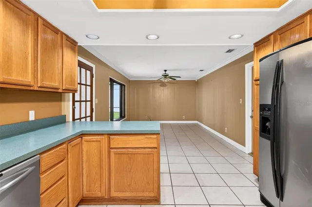 a bathroom with a sink a toilet a mirror and bathtub