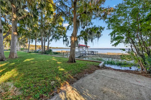 a view of a swimming pool with a patio