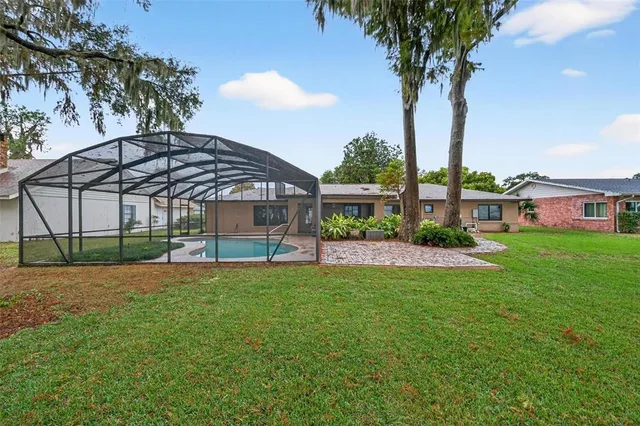 a view of a livingroom with an empty space and a window