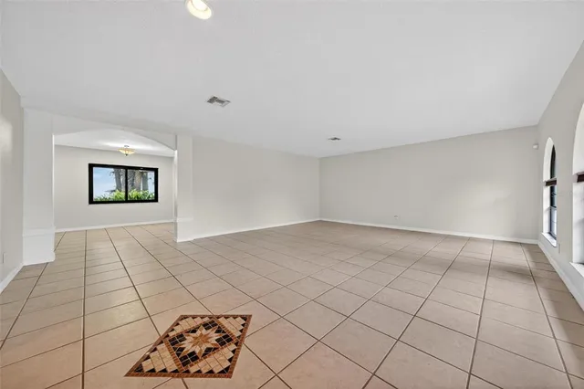 a view of an empty room and window
