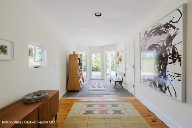 a kitchen with stainless steel appliances granite countertop a sink and a stove