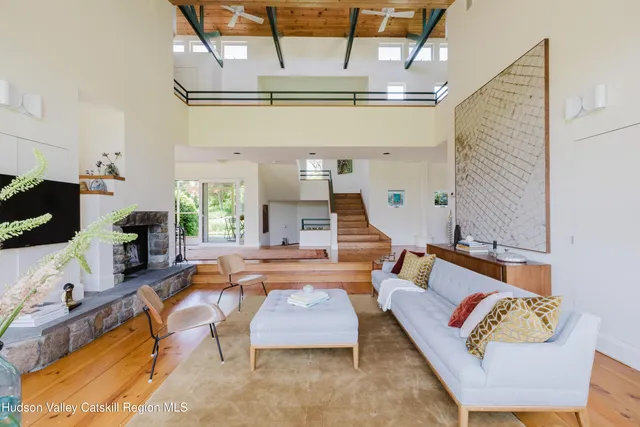 a kitchen with granite countertop a sink and a stove top oven