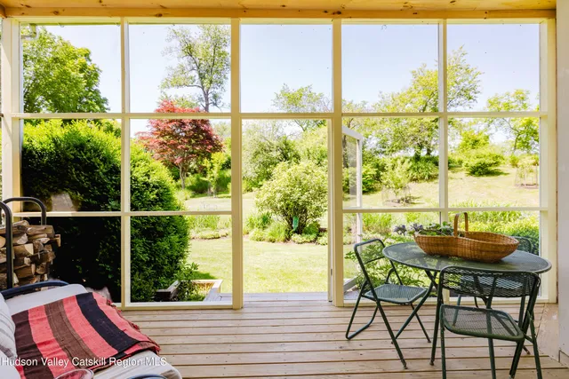 a bedroom with a bed and dresser