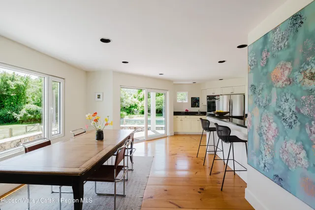 a bathroom with a tub and a sink
