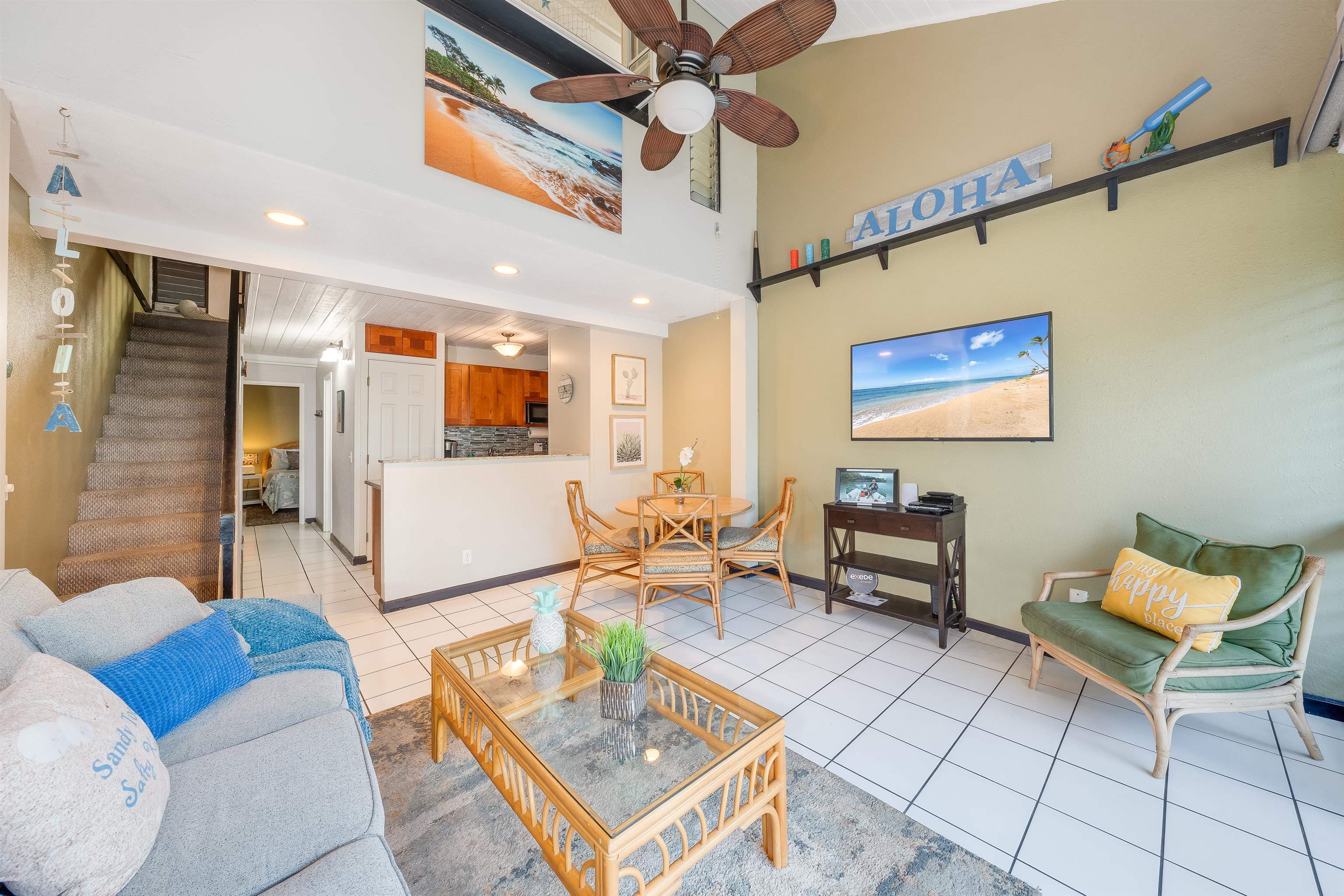 2191 South Kihei Road, Unit 2413 Kihei, HI 96753 - Photo 1 of 34 a living room with furniture and a flat screen tv