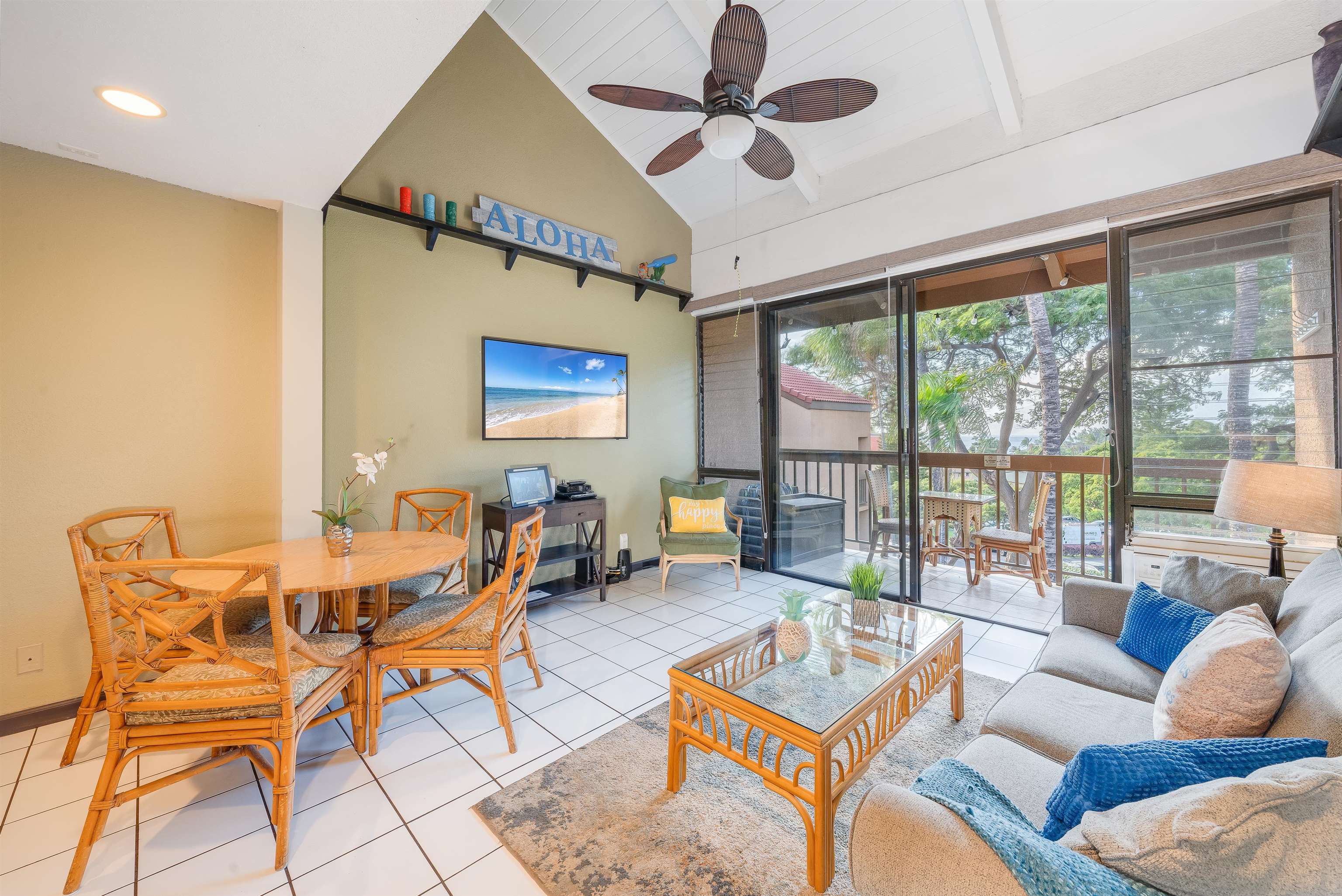 2191 South Kihei Road, Unit 2413 Kihei, HI 96753 - Photo 11 of 34 a living room with furniture and a large window