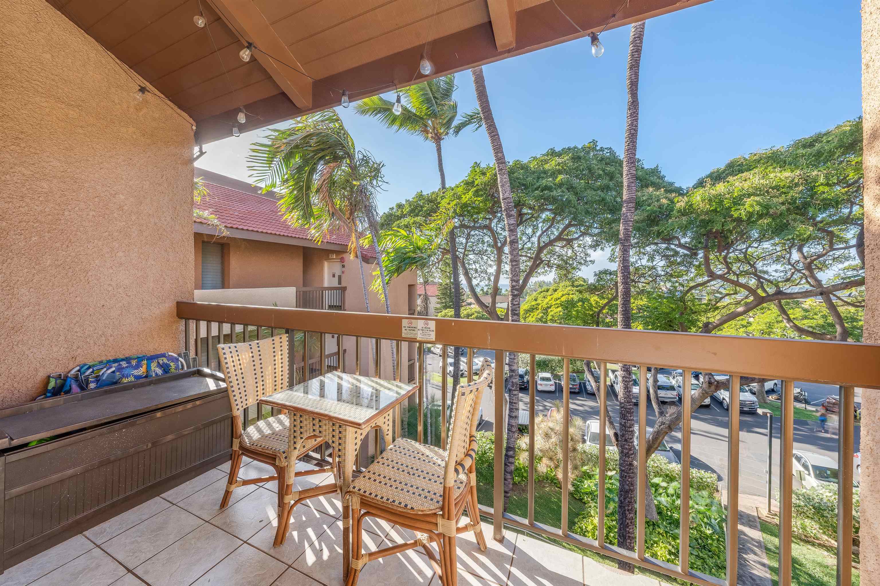2191 South Kihei Road, Unit 2413 Kihei, HI 96753 - Photo 23 of 34 a view of a balcony with furniture