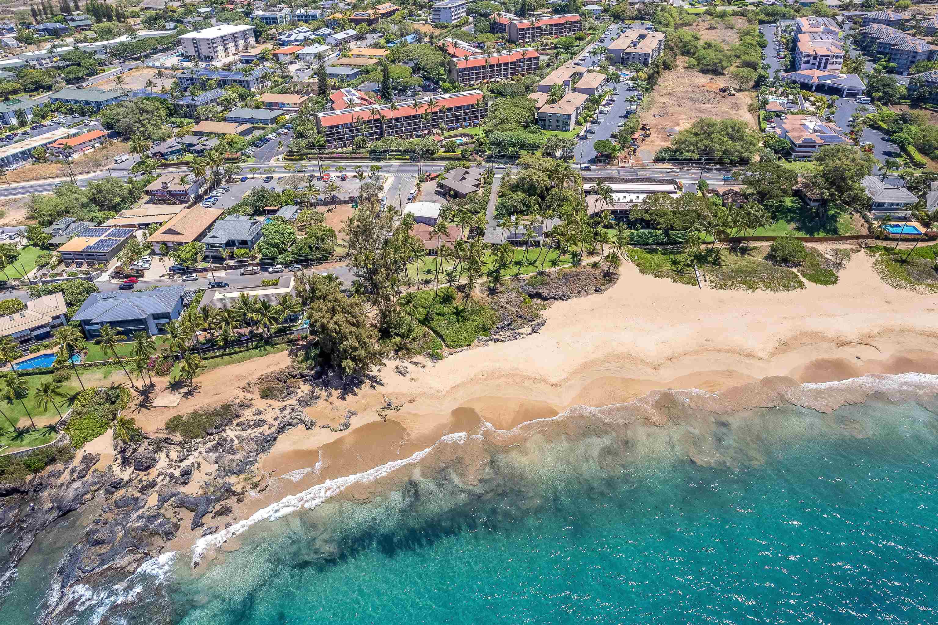 2191 South Kihei Road, Unit 2413 Kihei, HI 96753 - Photo 31 of 34 an aerial view of residential houses with outdoor space and trees