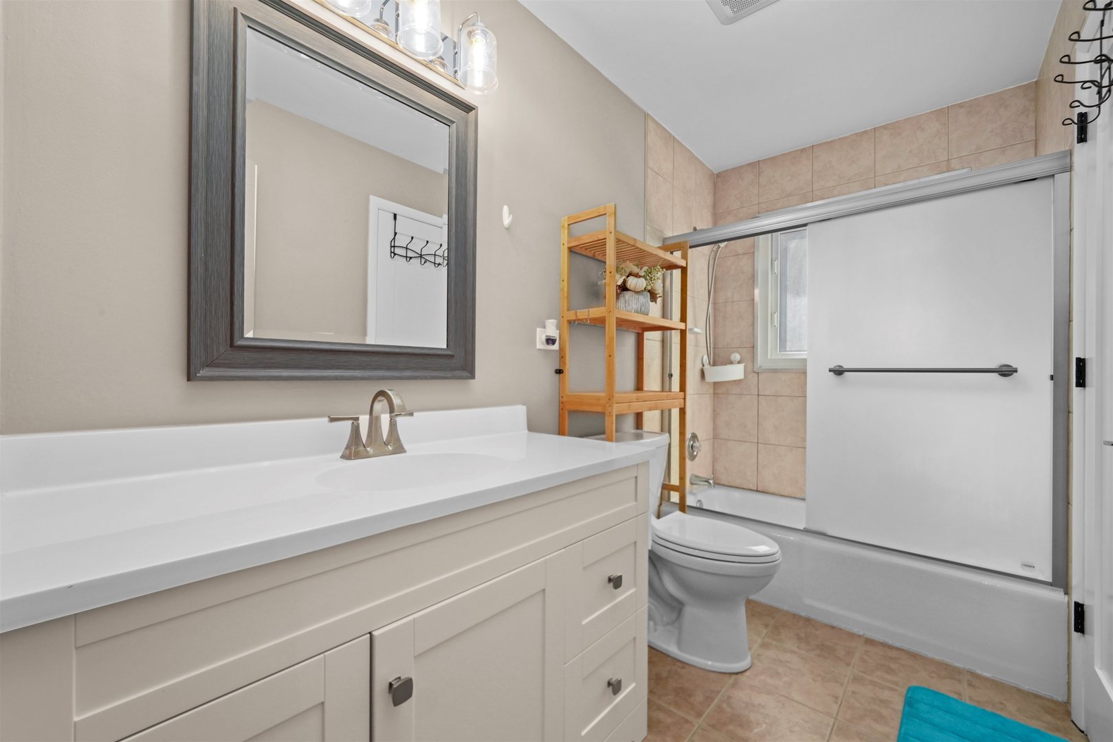 311 Harding Avenue Libertyville, IL 60048 - Photo 19 of 41 a bathroom with a sink a toilet and shower