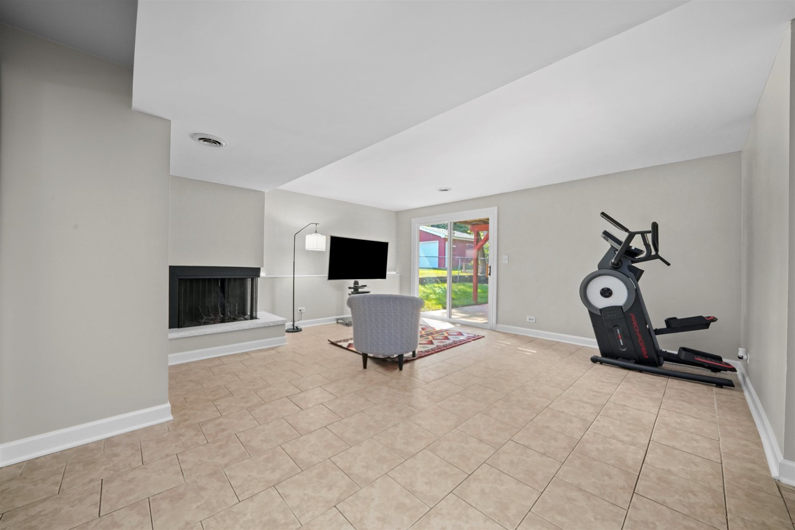 311 Harding Avenue Libertyville, IL 60048 - Photo 23 of 41 a living room with furniture and a flat screen tv