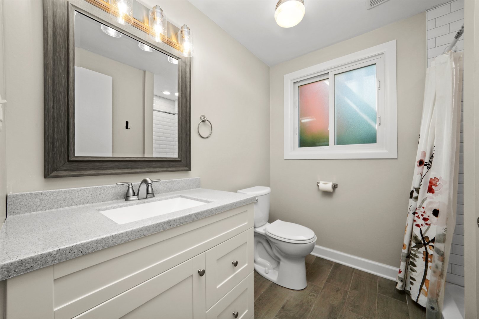 311 Harding Avenue Libertyville, IL 60048 - Photo 26 of 41 a bathroom with a granite countertop sink mirror and toilet