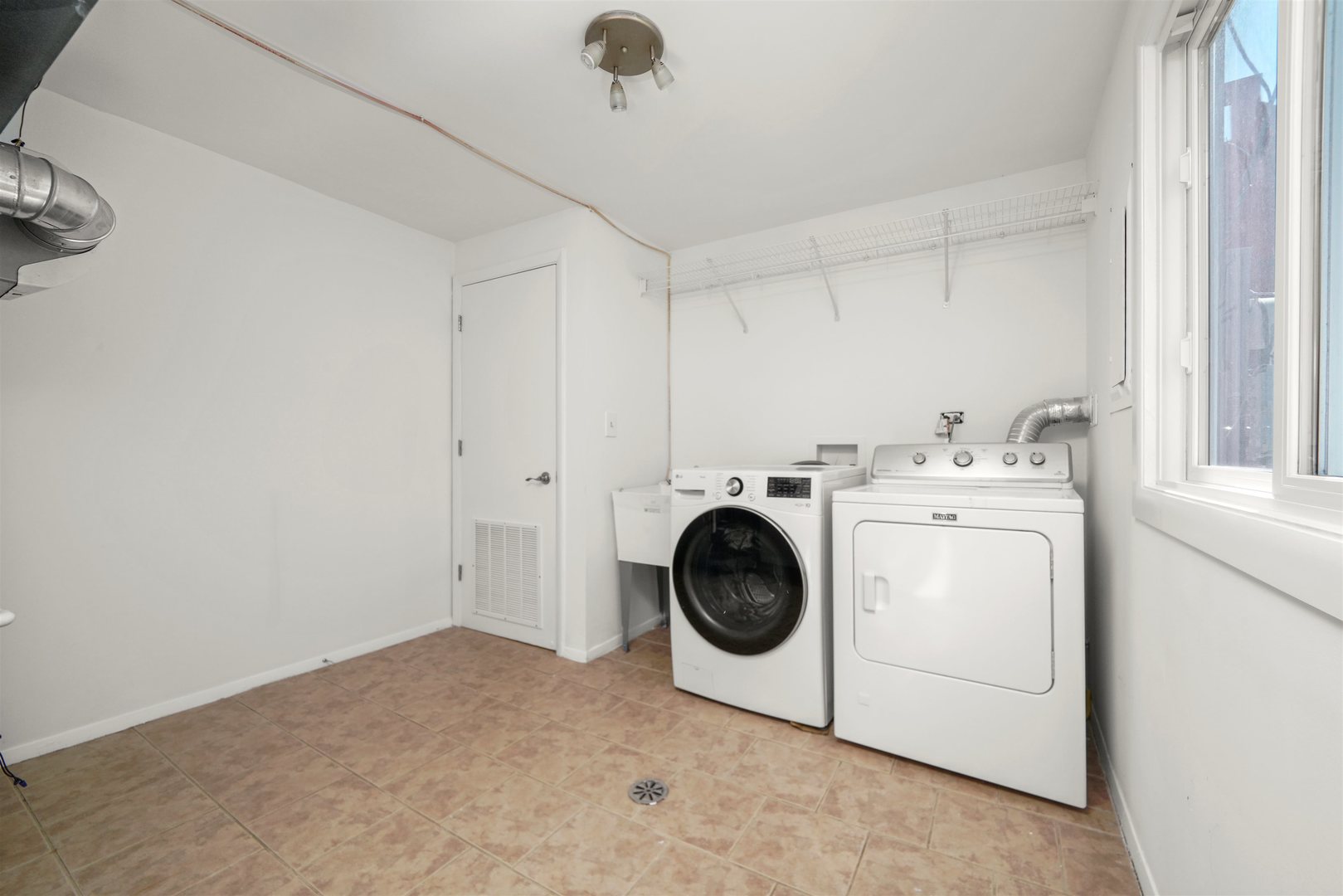 311 Harding Avenue Libertyville, IL 60048 - Photo 28 of 41 a utility room with dryer and washer