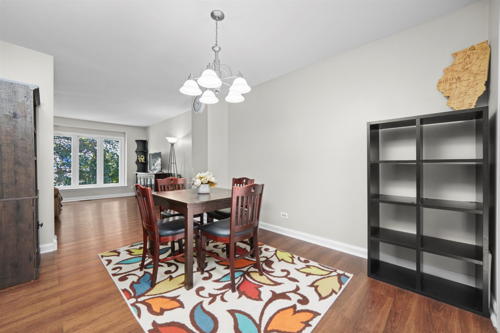 311 Harding Avenue Libertyville, IL 60048 - Photo 9 of 41 a view of a dining room with furniture window and wooden floor