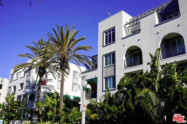 a front view of a multi story residential apartment building