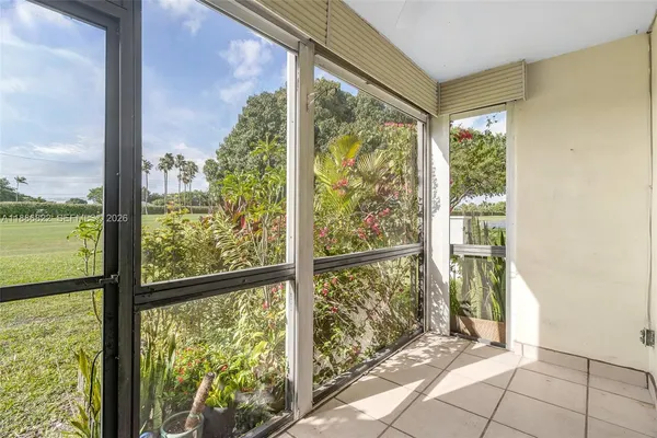 a view of an outdoor space with a large window