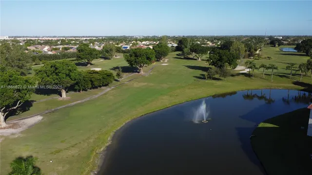 a view of a lake with a yard