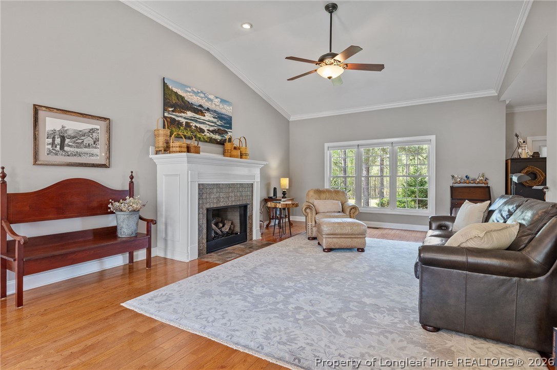 30180 East Lake Road Wagram, NC 28396 - Photo 12 of 42 a living room with furniture and a fireplace
