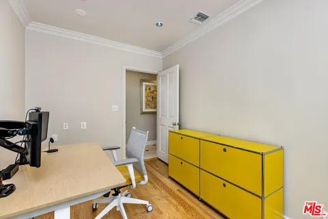 view of a bathroom with a sink and a mirror