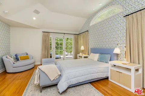 a bathroom with a bathtub and a sink