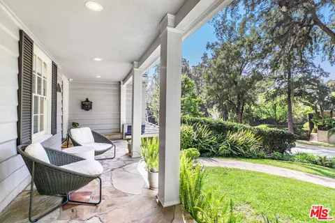 a outdoor living space with furniture and garden view