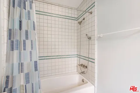 a view of a backyard with sitting area