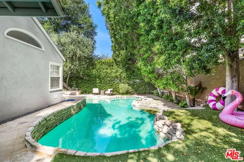 a view of an entryway with a kitchen