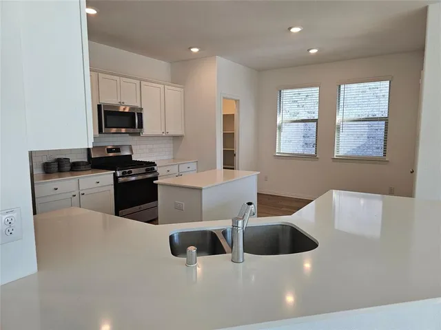 a view of a house with entertaining space