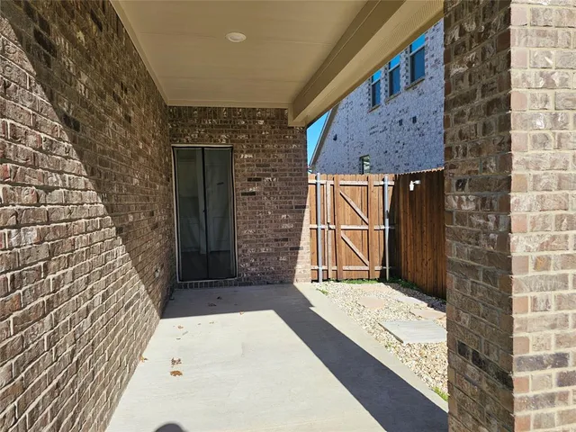 a house with trees in the background